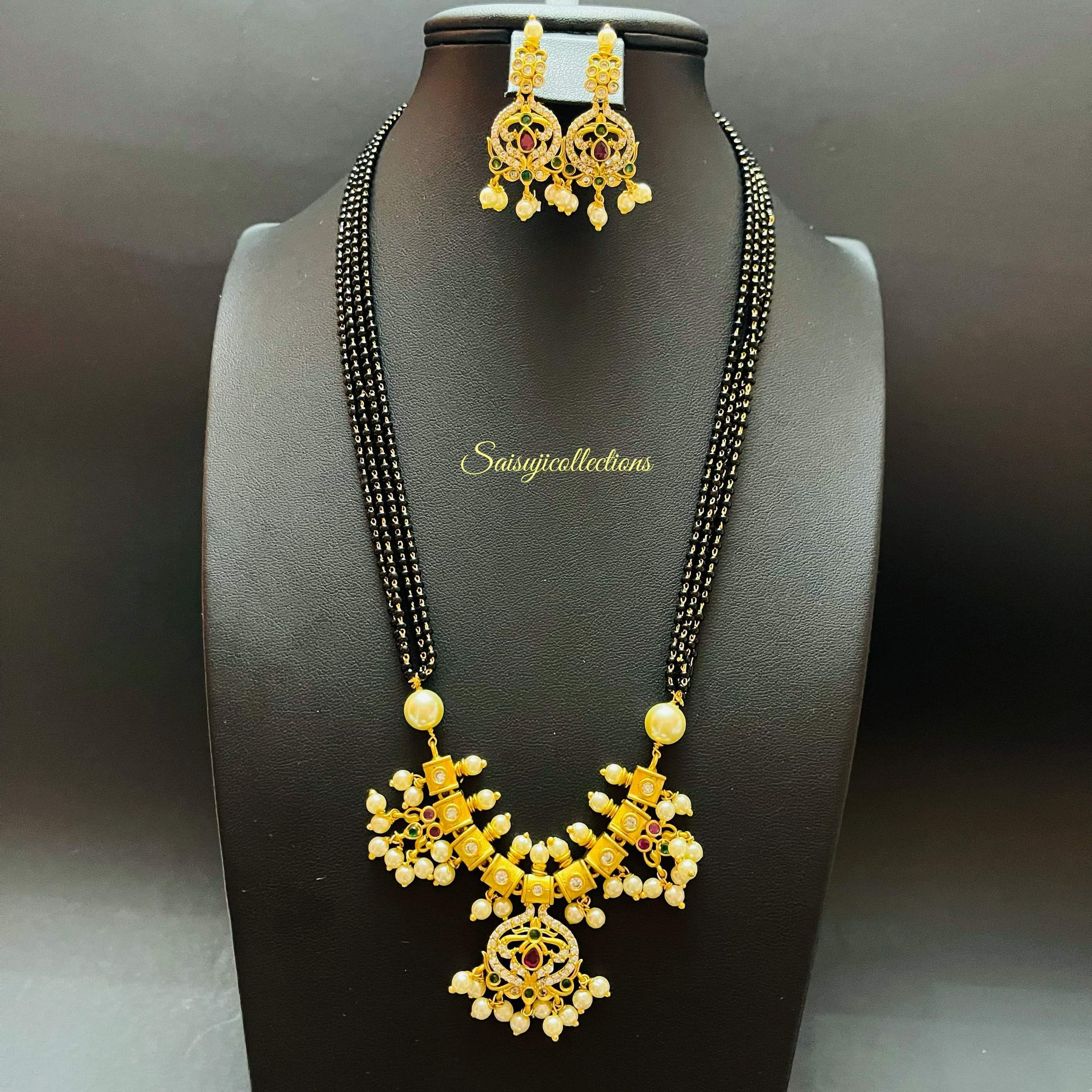 Mangalsutra | Bridal gold jewellery, Black beaded jewelry, Gold mangalsutra  designs