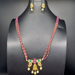 Beautiful magenta Beads AD And Multi Stone Locket With Small Earrings