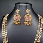 Beautiful Multi Strand Rice Pearl Set With AD And Pink Stone Locket And Earrings