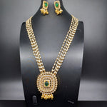 Beautiful Multi Strand Rice Pearl Set With AD And Emerald Stone Locket And Earrings