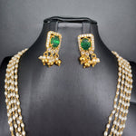 Beautiful Multi Strand Rice Pearl Set With AD And Emerald Stone Locket And Earrings