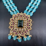 Beautiful Multi Strand Sugar Beads Set With Lite Blue Monalisa Beads With Green Stone Locket And Earrings