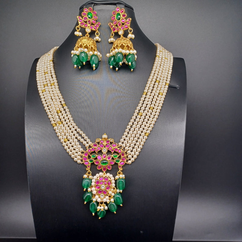 Beautiful Multi Strand Pearls Multi Stone Jadav Kundan Peacock Locket And Jumka