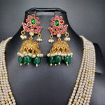 Beautiful Multi Strand Pearls Multi Stone Jadav Kundan Peacock Locket And Jumka