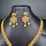 Beautiful Gold Finish AD And Multi Stone Lakshmi Devi Necklace Set With Earrings