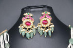 Beautiful Pastel Green And Pearl Set With multi Stone Peacock Locket And With Earrings