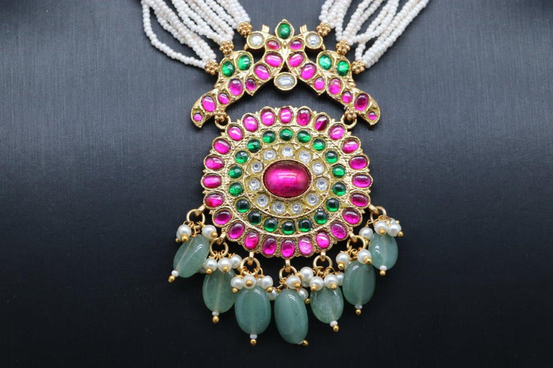 Beautiful Pastel Green And Pearl Set With multi Stone Peacock Locket And With Earrings