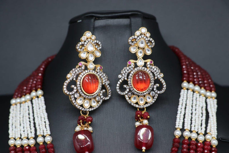Elegant Polki Kundan And Carved Stone Pearl And Marron Color Beads Set With Earrings