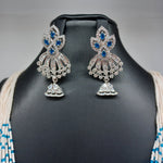 Elegant Multi Strand Sugar Beads Set With AD and Blue Stone White Polish Locket And Earrings