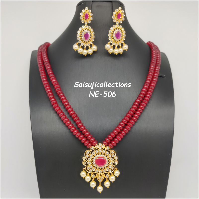 Beautiful 2 Lane Ruby Beads Mala With AD And Ruby Stone Locket And Ear –  SaiSuji Collections